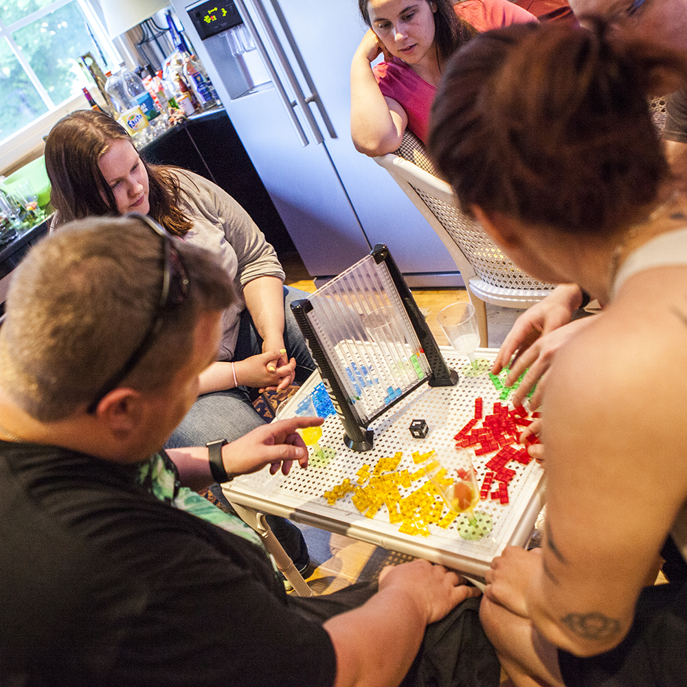People playing Tetris Link board game