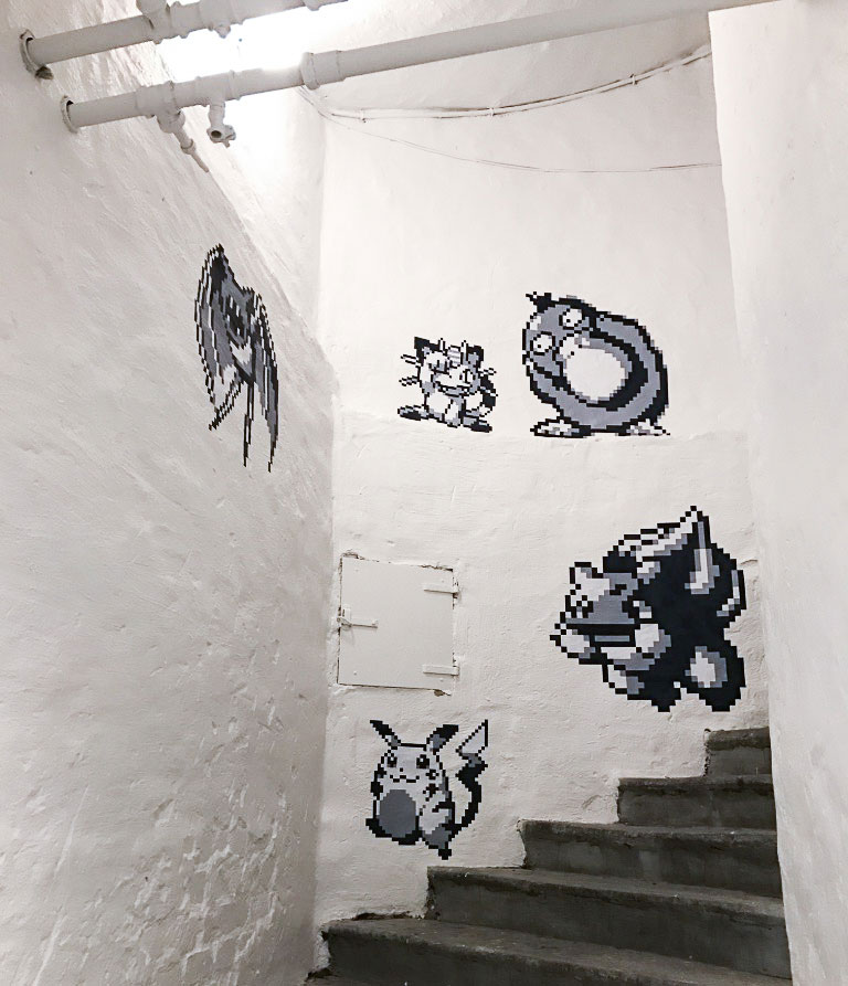 Gameboy sprites decorating the walls of Stockholm's game museum