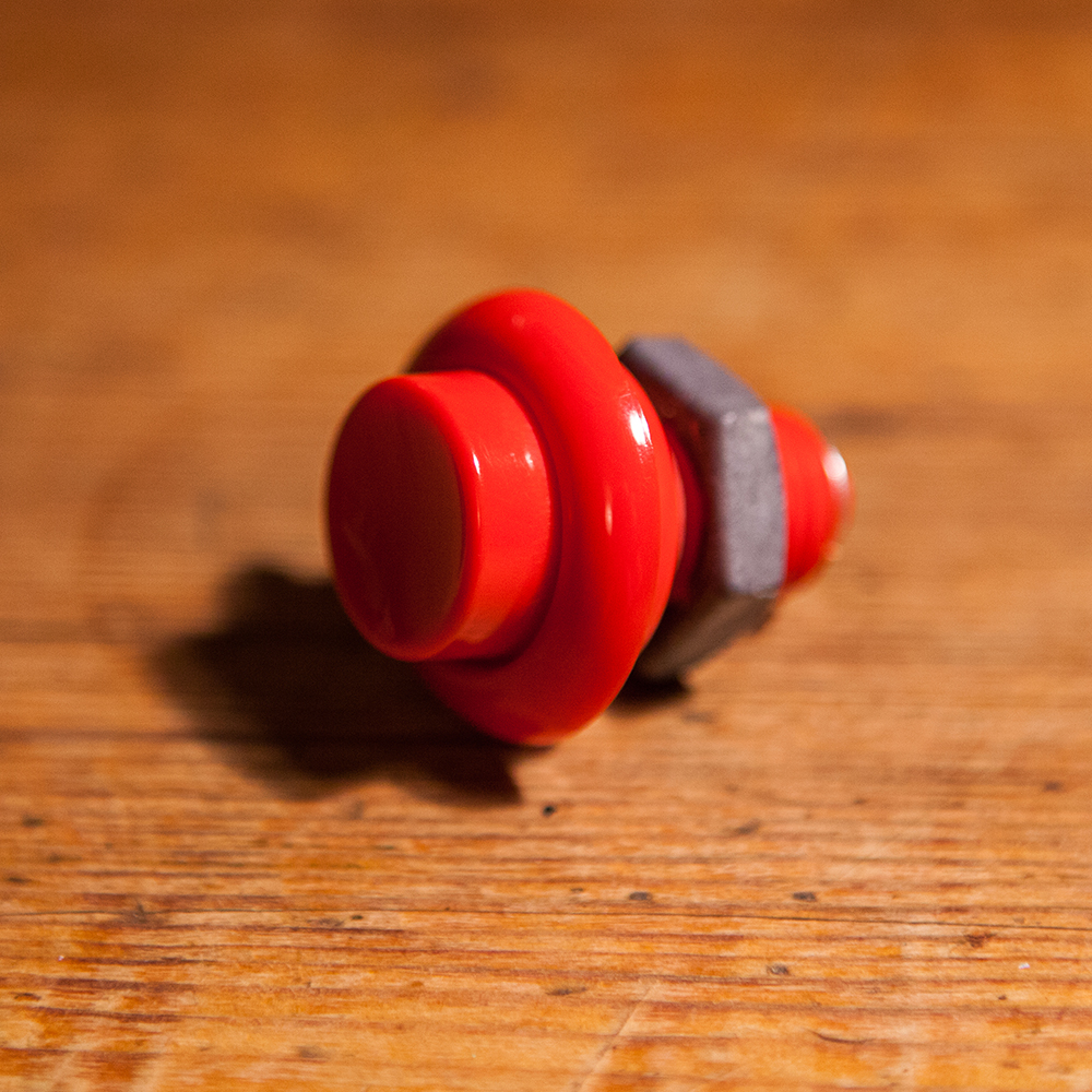 Red arcade button
