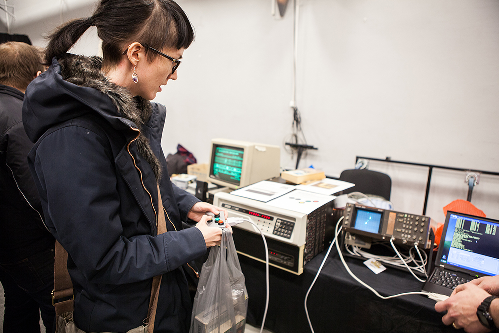 Gabriella trying out Spacewar