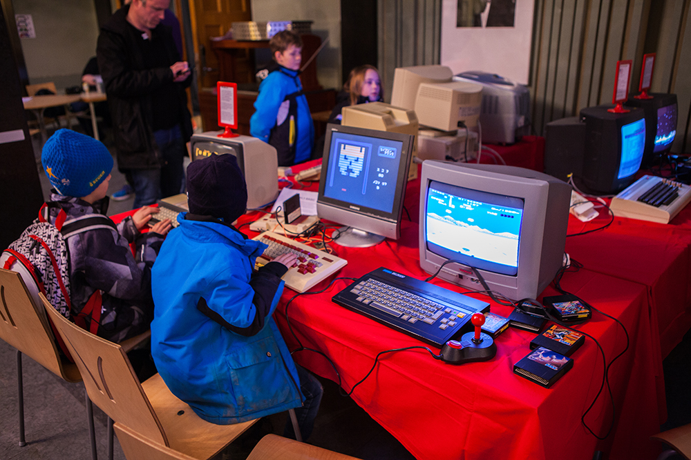 Kids playing old computer games